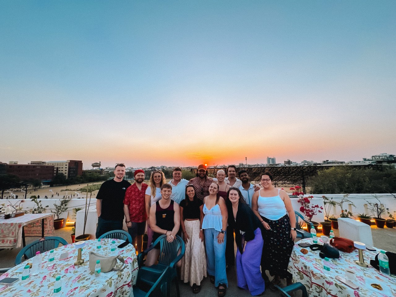 Group of solo travellers on a group tour with TruTravels enjoying a cooking class in Jaipur