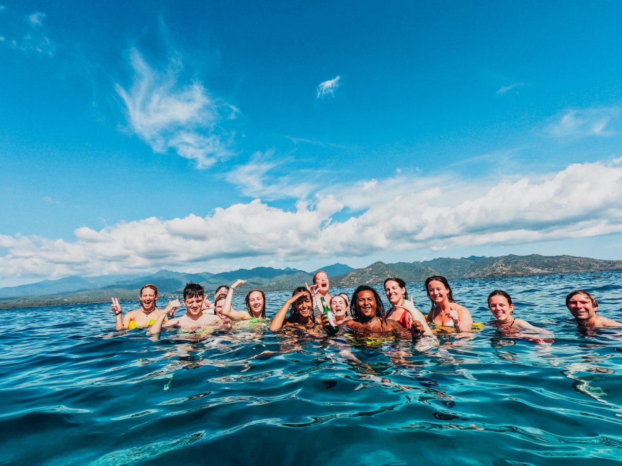 A group shot while snorkelling in the blue sea in Gili Trawangan, Indonesia 